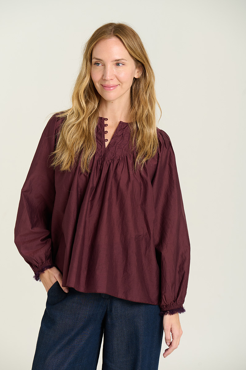 Blouse with pleated detail