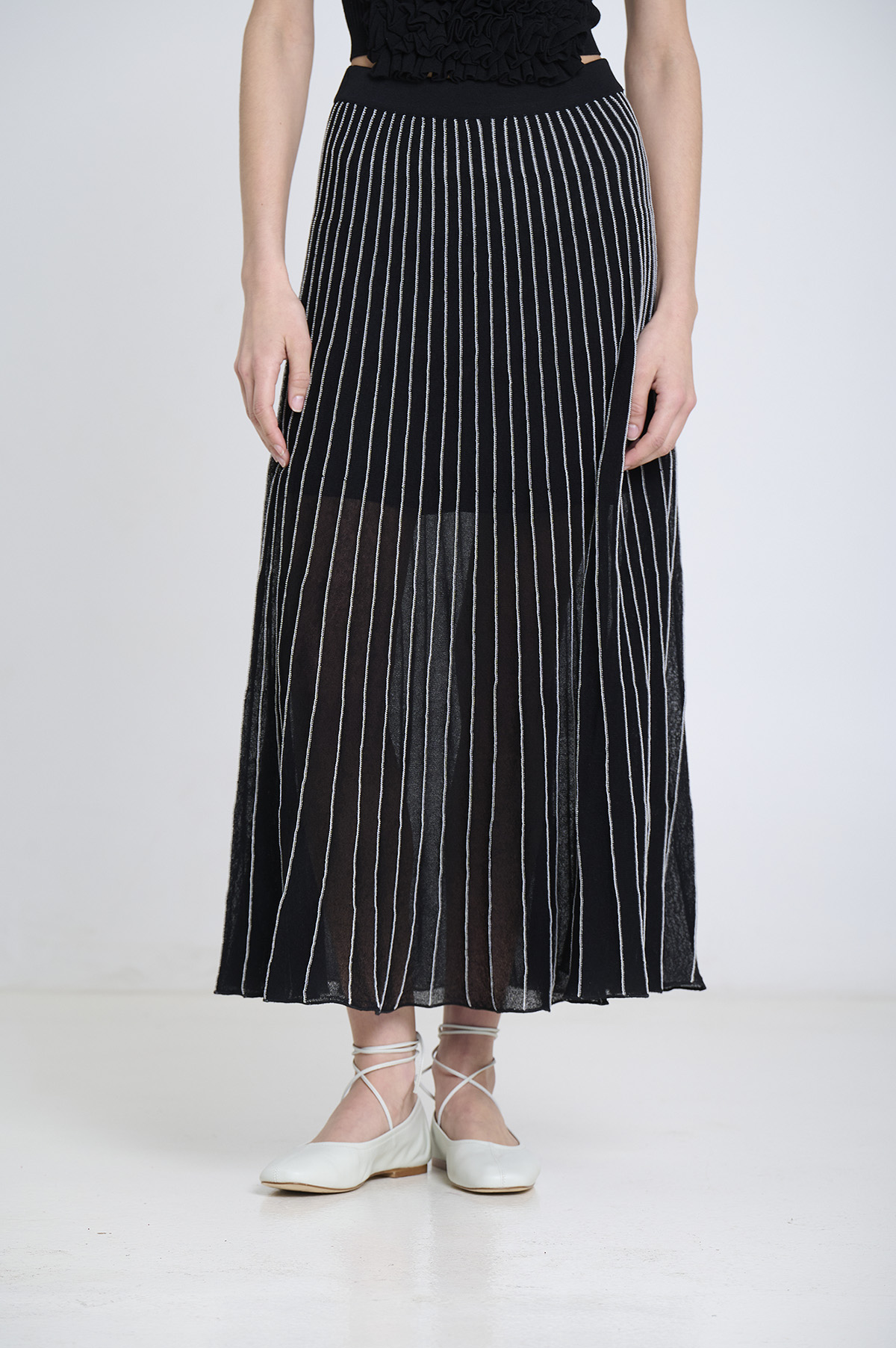 Falda midi radial | ICONIC PIECES 1