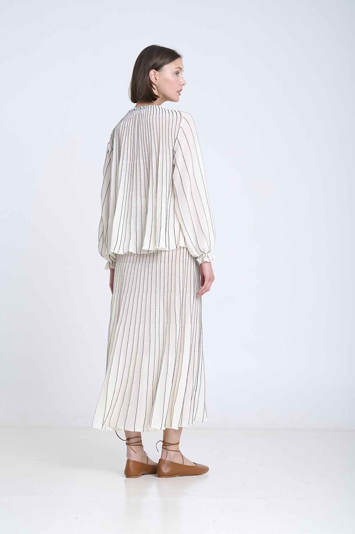 Radial knitted blouse | ICONIC PIECES 11