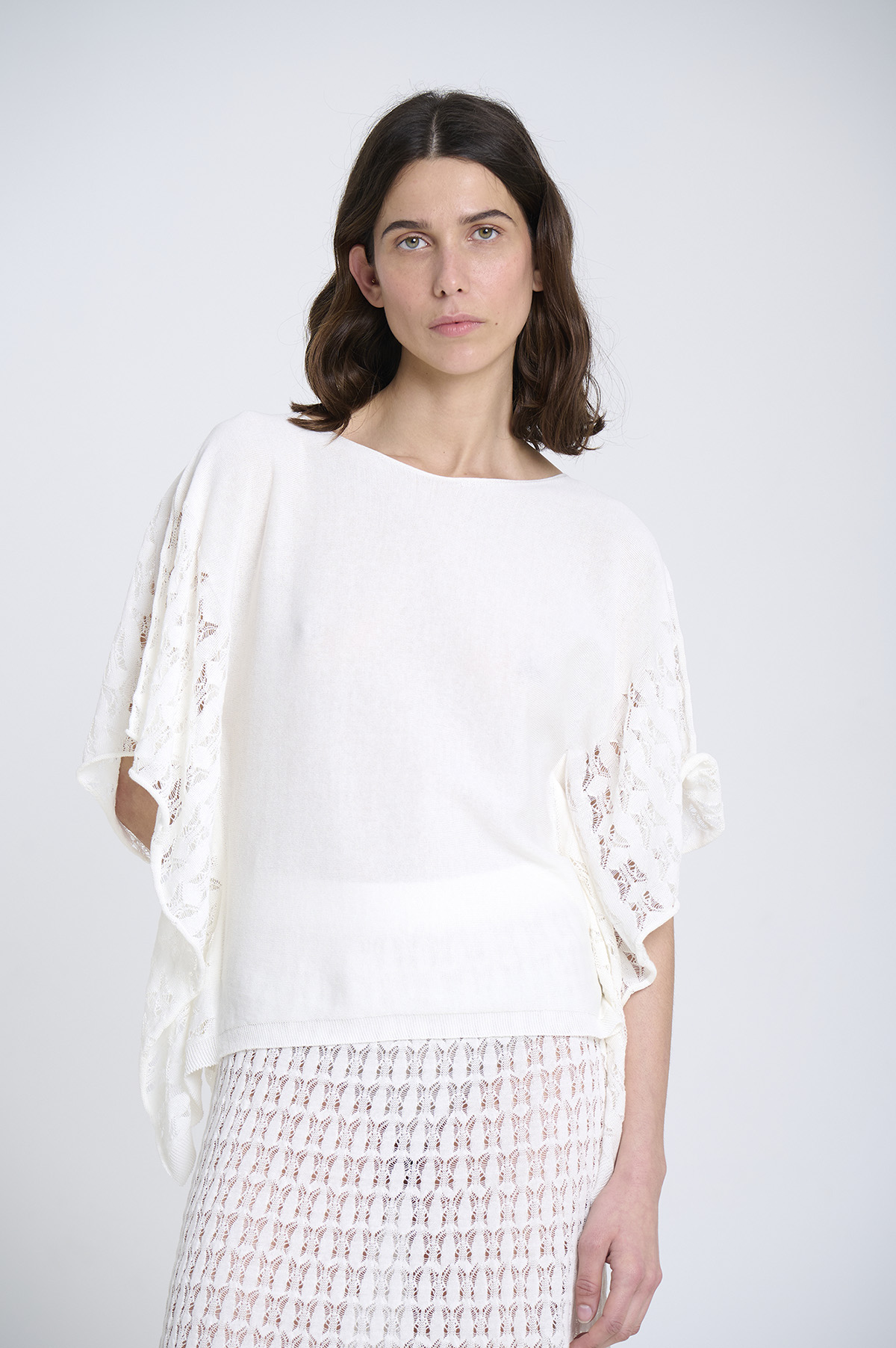 Capa de punto con laterales calados 1