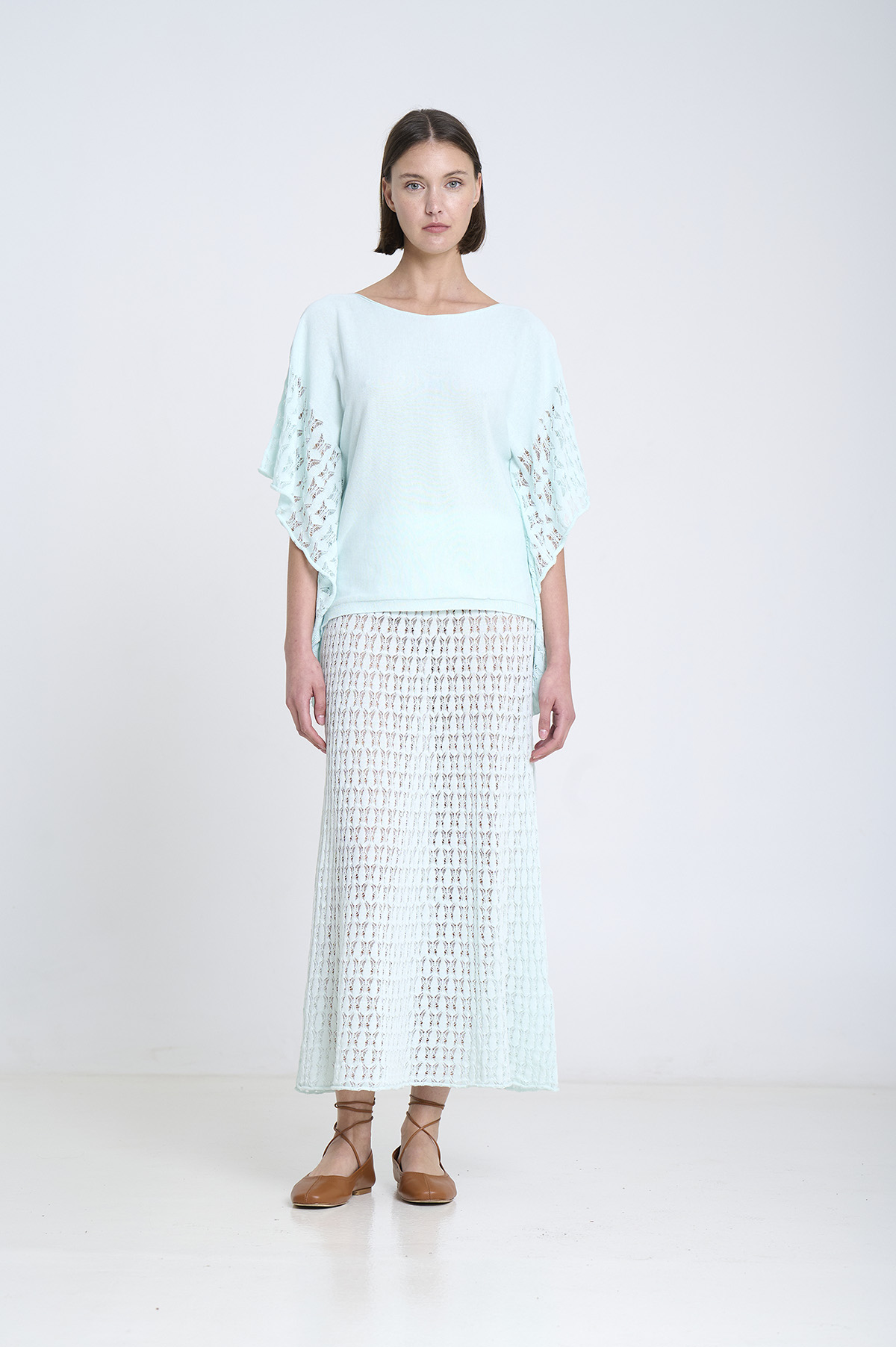 Capa de punto con laterales calados 4