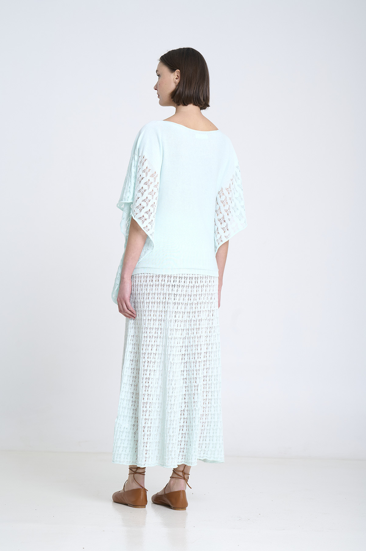 Capa de punto con laterales calados 8