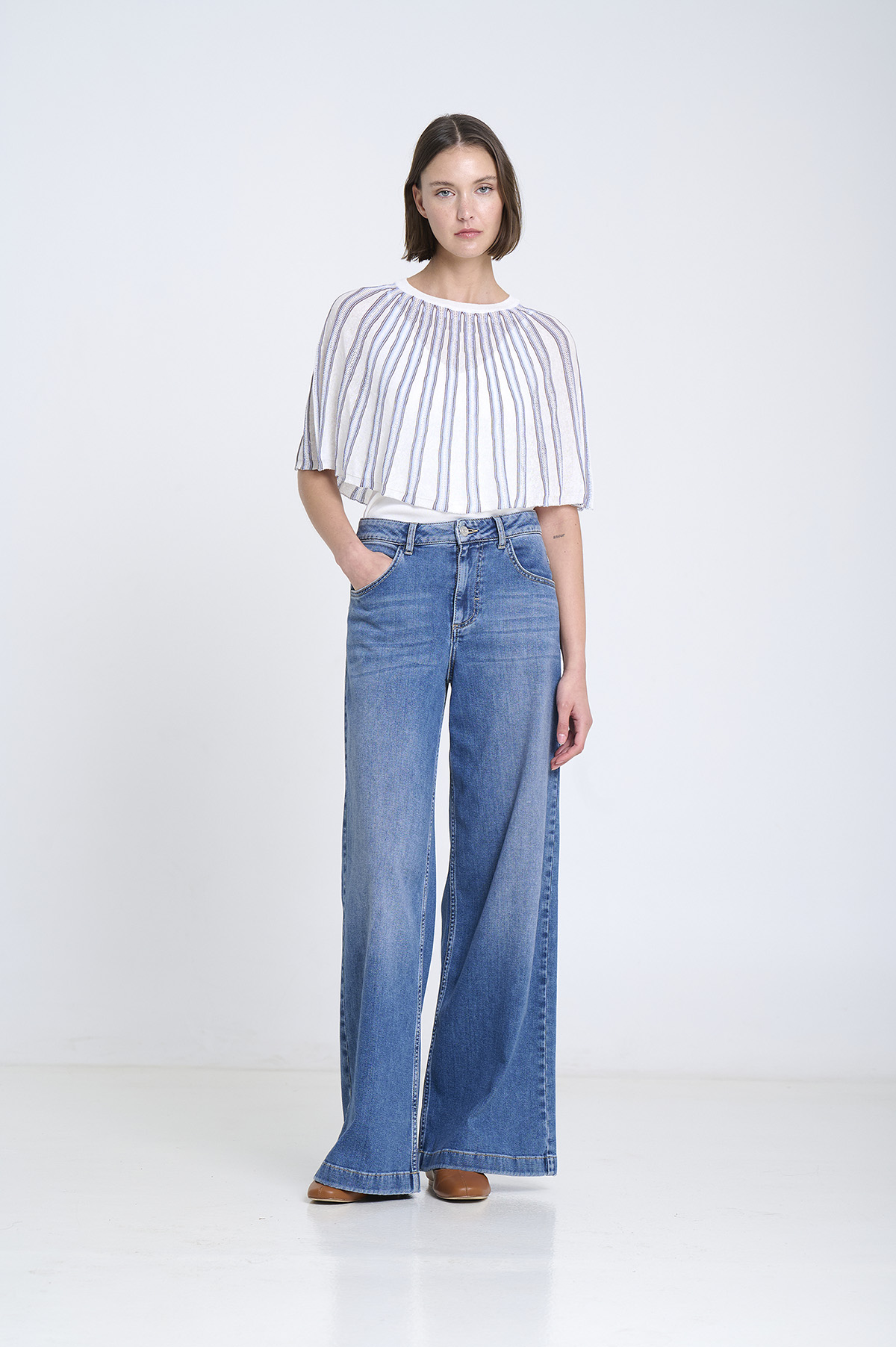 Capa punto radial a rayas | ICONIC PIECES