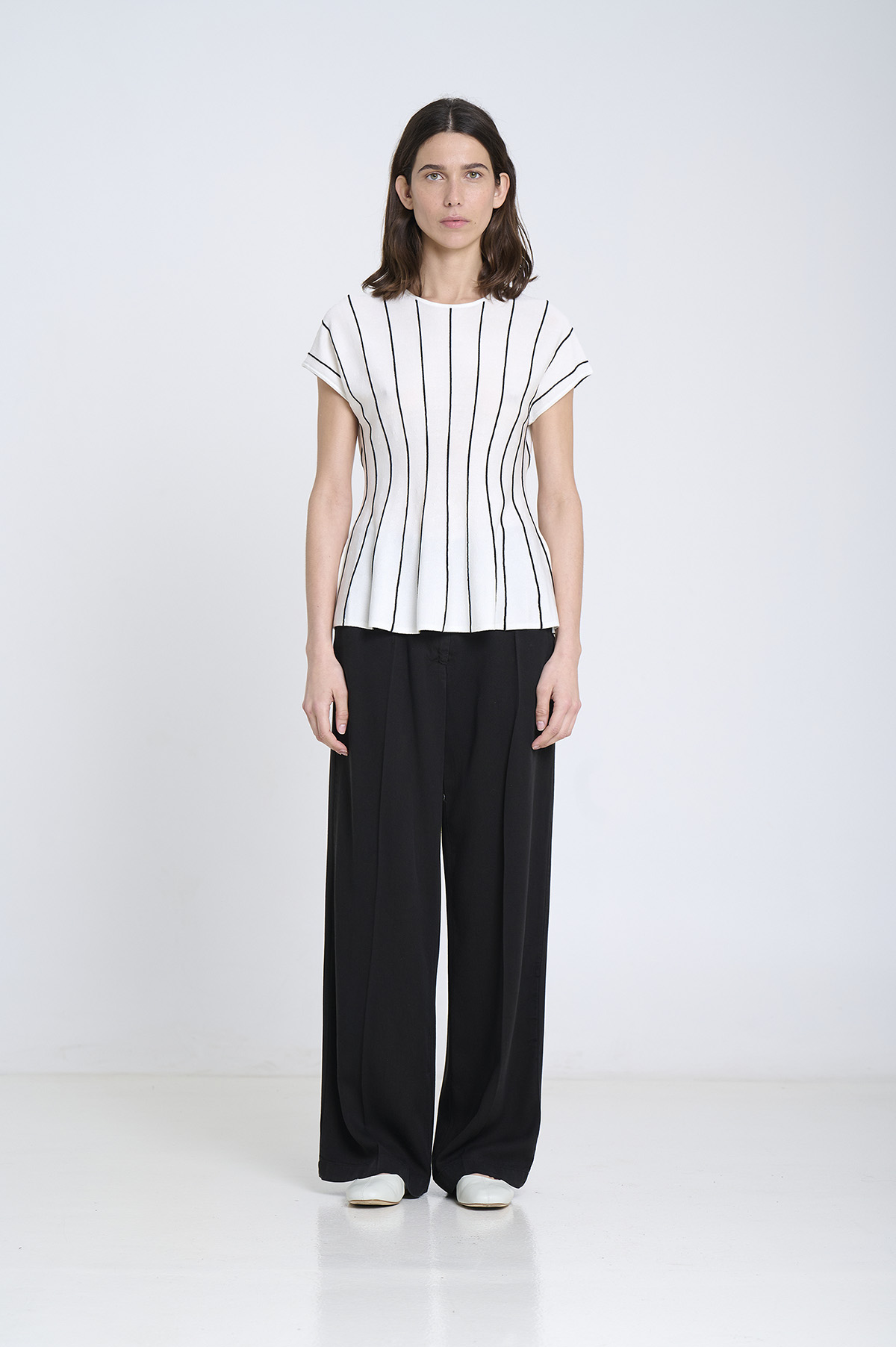 Vertical striped peplum top | ICONIC PIECES 1