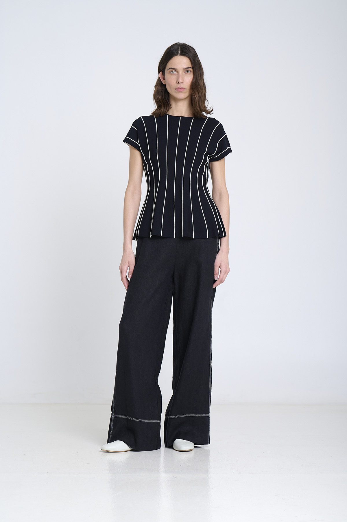 Vertical striped peplum top | ICONIC PIECES