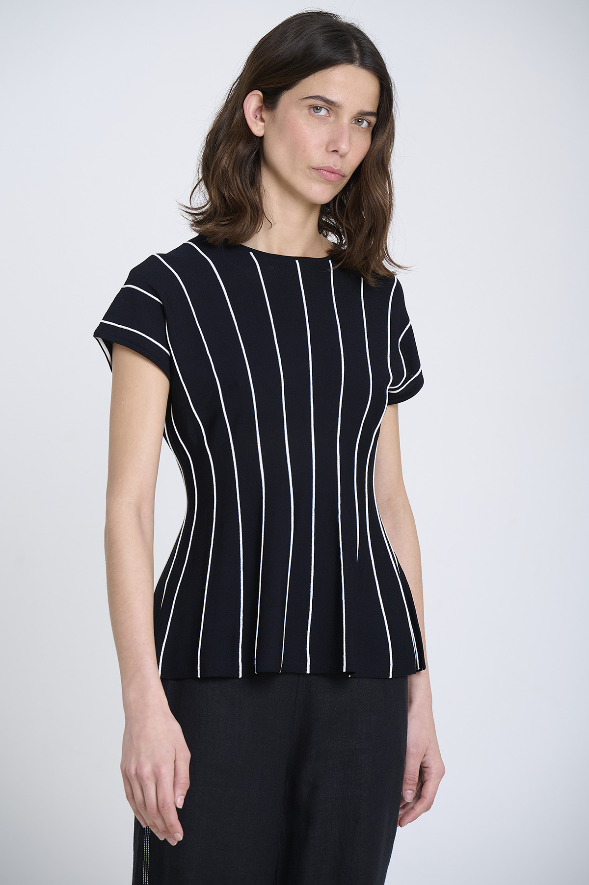 Vertical striped peplum top | ICONIC PIECES 1
