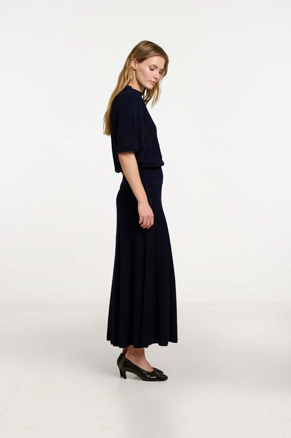 Radial knit poncho | ICONIC PIECES 6